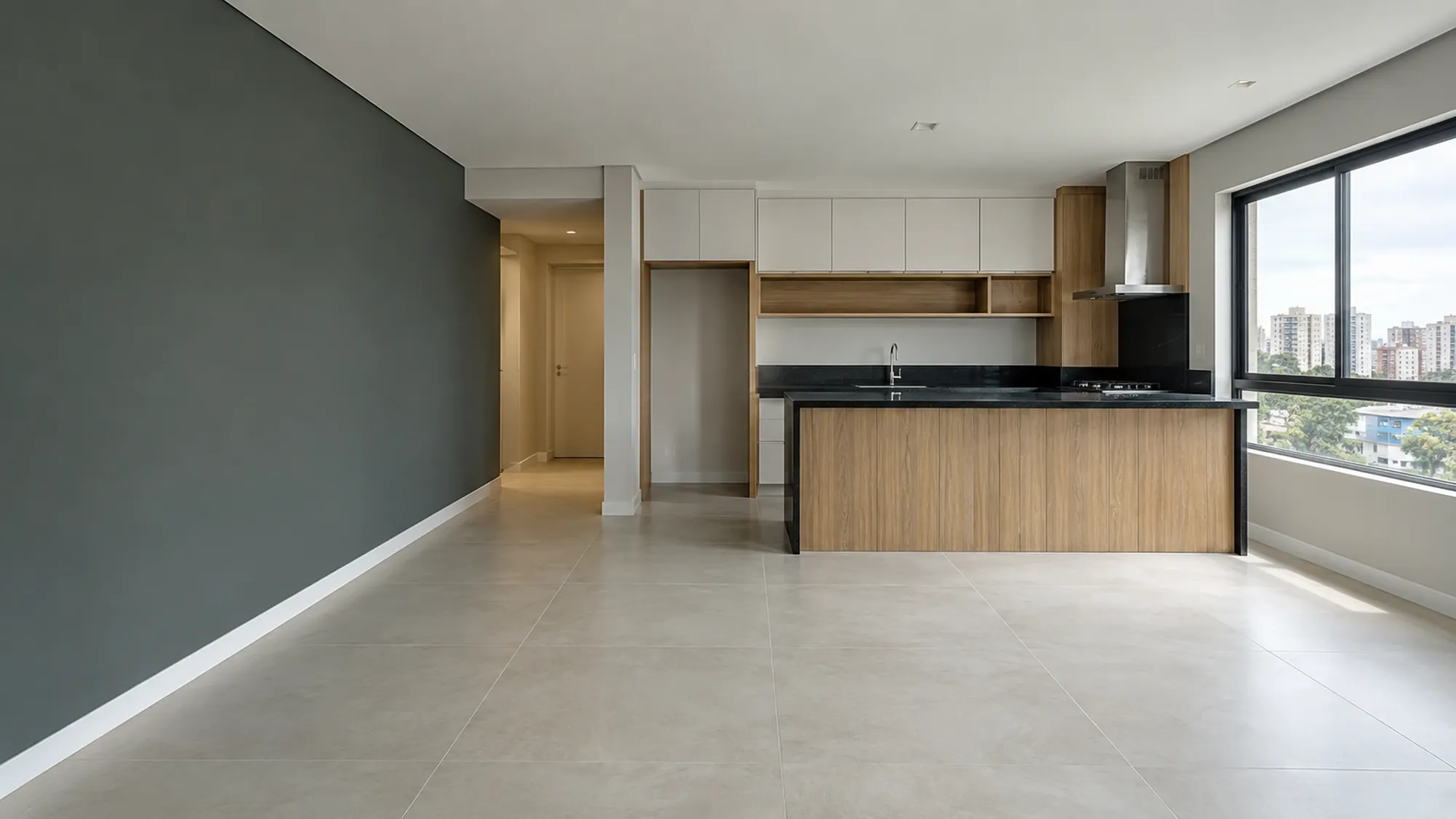 Sala integrada à cozinha de apartamento recém-reformado